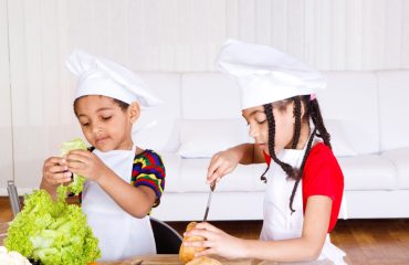 Siblings making sandwich